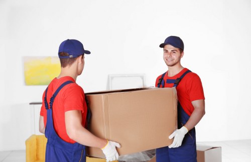 Removal team loading office items with local access considerations