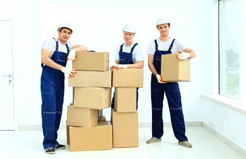 Moving van pricing in Kennington with boxes and furniture being loaded