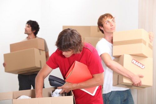 Careful loading of furniture and appliances into a removal van
