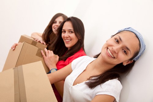 Packing and loading furniture into a removals van