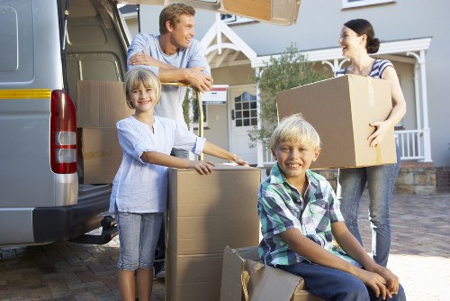 Loading household items into a removal truck in Kennington