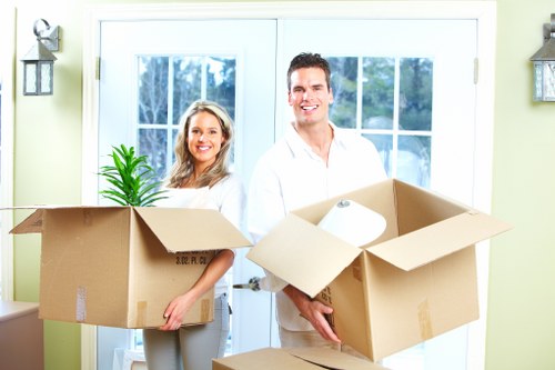Local moving team loading furniture for a suburban relocation